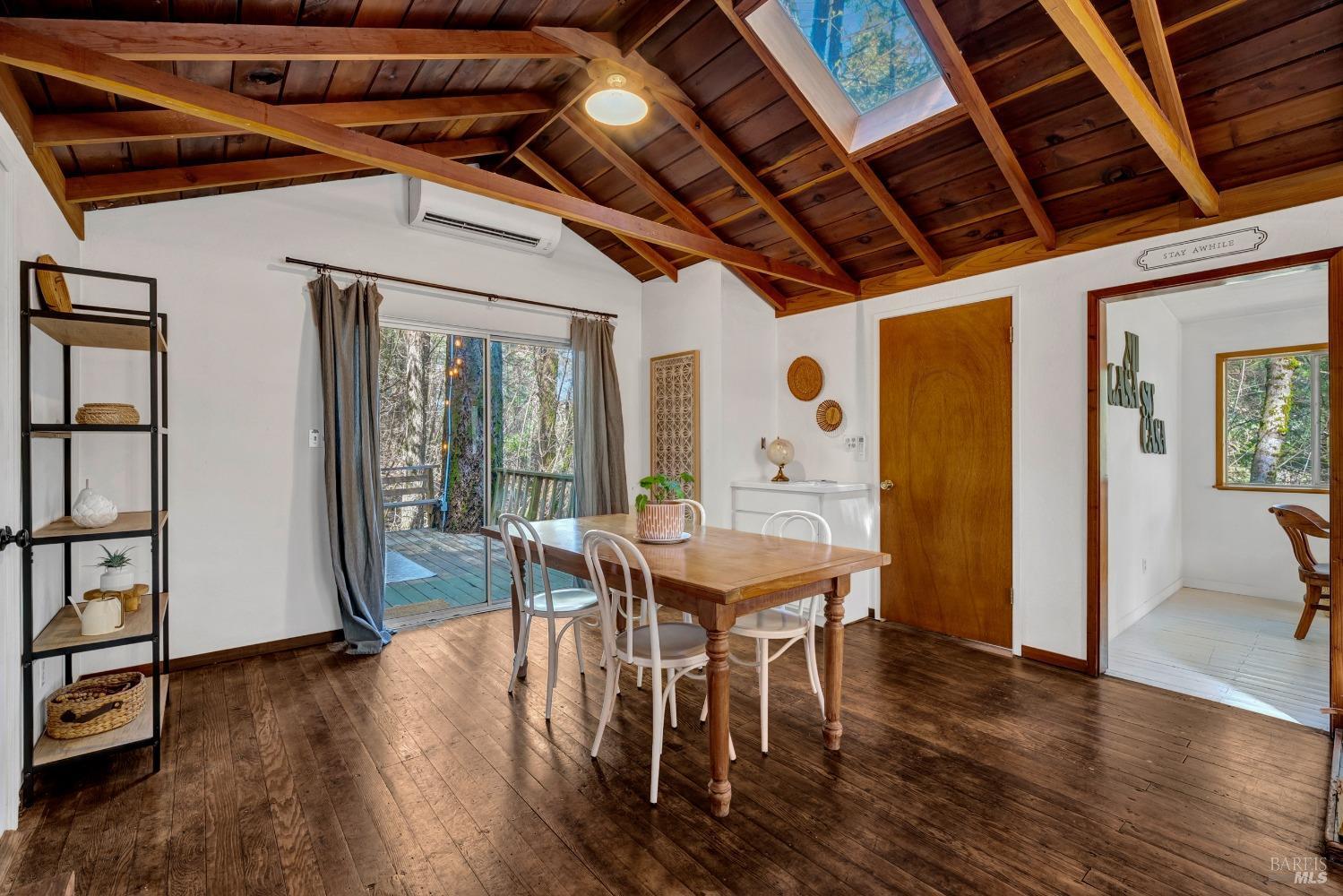 17000 Edgewood Way Middletown, CA 95461 - Photo 20 of 40 a dining room with furniture window wooden floor