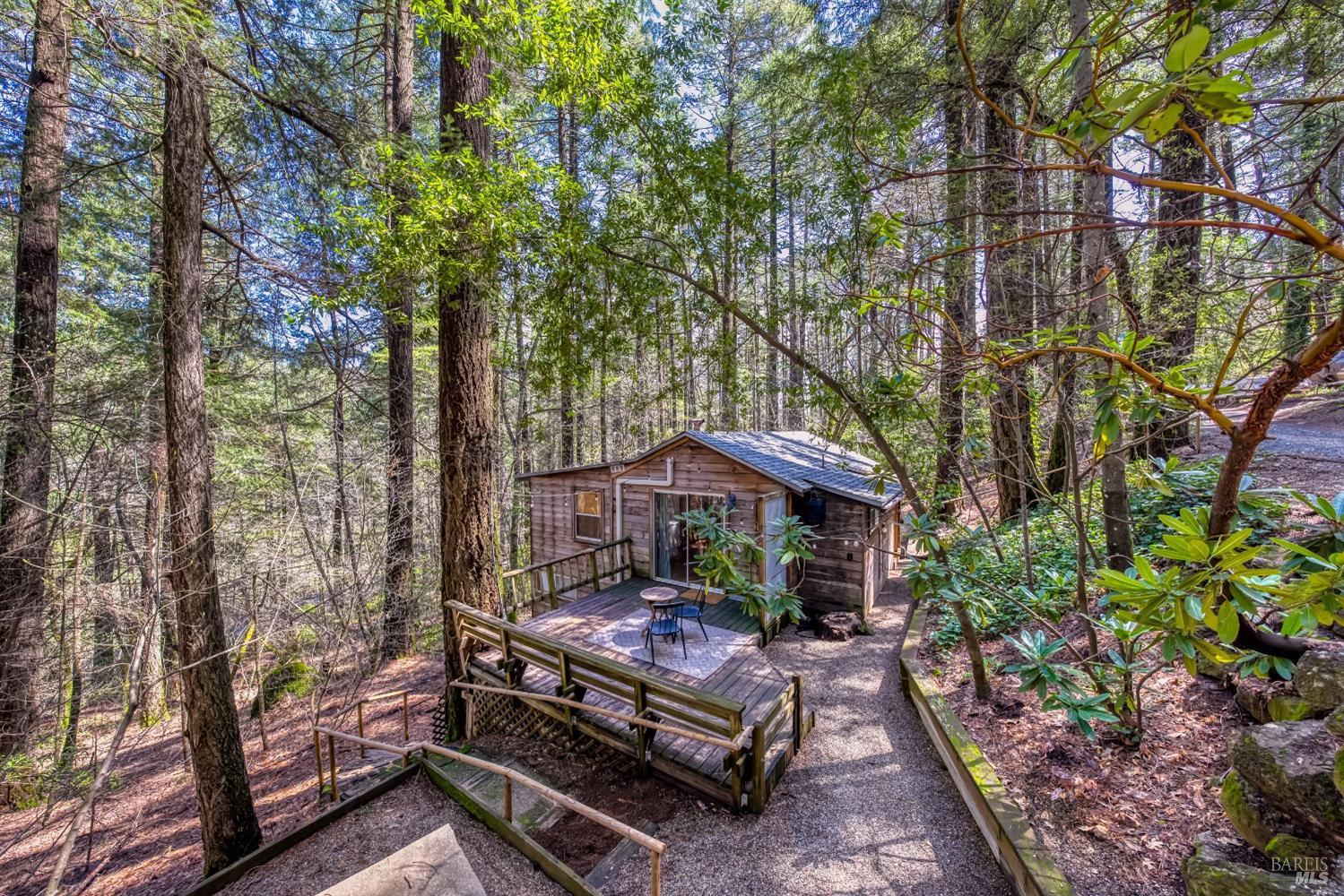 17000 Edgewood Way Middletown, CA 95461 - Photo 2 of 40 a view of a chairs and tables in the backyard