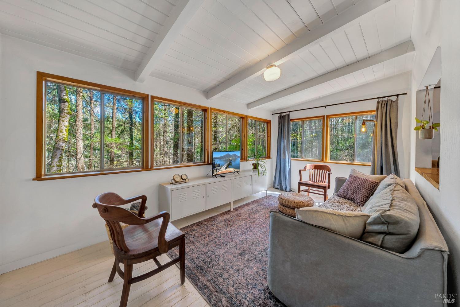 17000 Edgewood Way Middletown, CA 95461 - Photo 23 of 40 a living room with furniture and a large window
