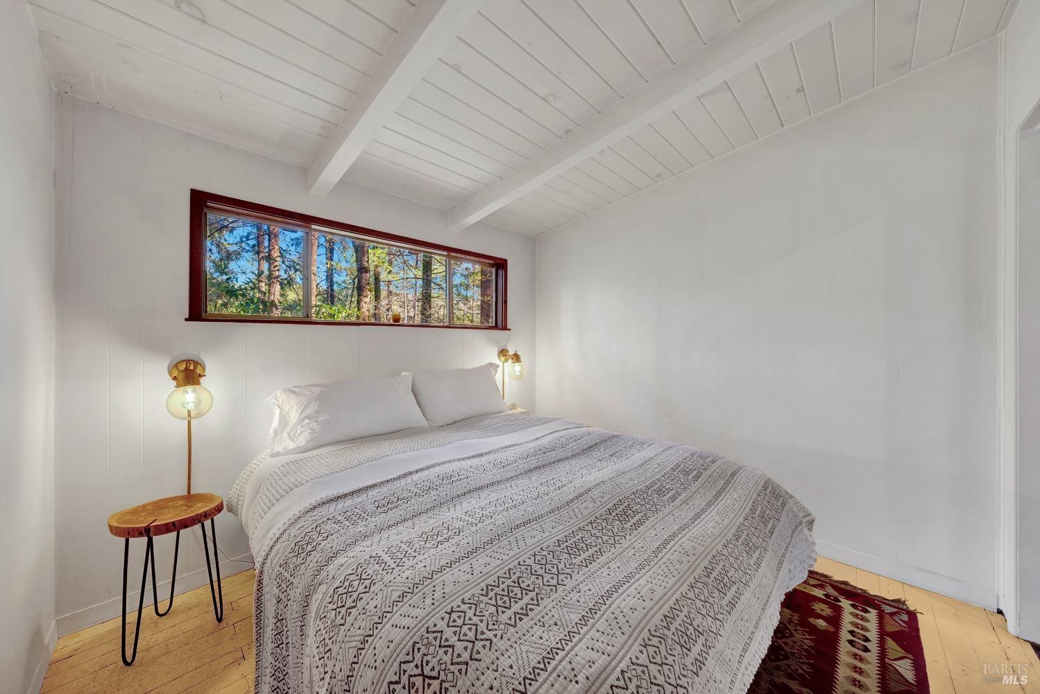 17000 Edgewood Way Middletown, CA 95461 - Photo 27 of 40 a bedroom with a bed and a window