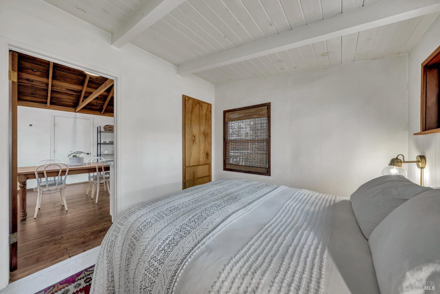 17000 Edgewood Way Middletown, CA 95461 - Photo 28 of 40 a bedroom with a bed and a view of kitchen