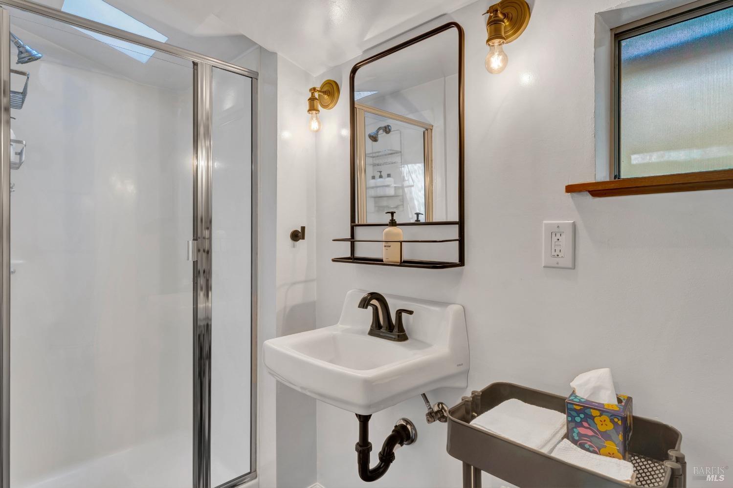 17000 Edgewood Way Middletown, CA 95461 - Photo 29 of 40 a bathroom with a sink and a mirror