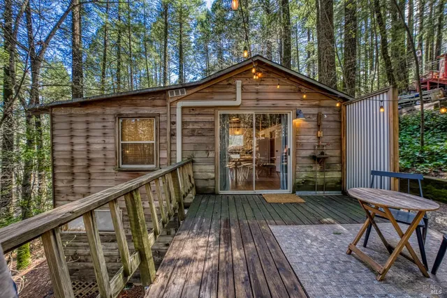 a view of a chairs and table on the wooden floor