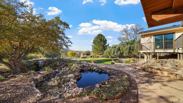 a view of a patio with a table chairs and a patio