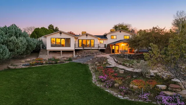 an aerial view of a house with mountain view
