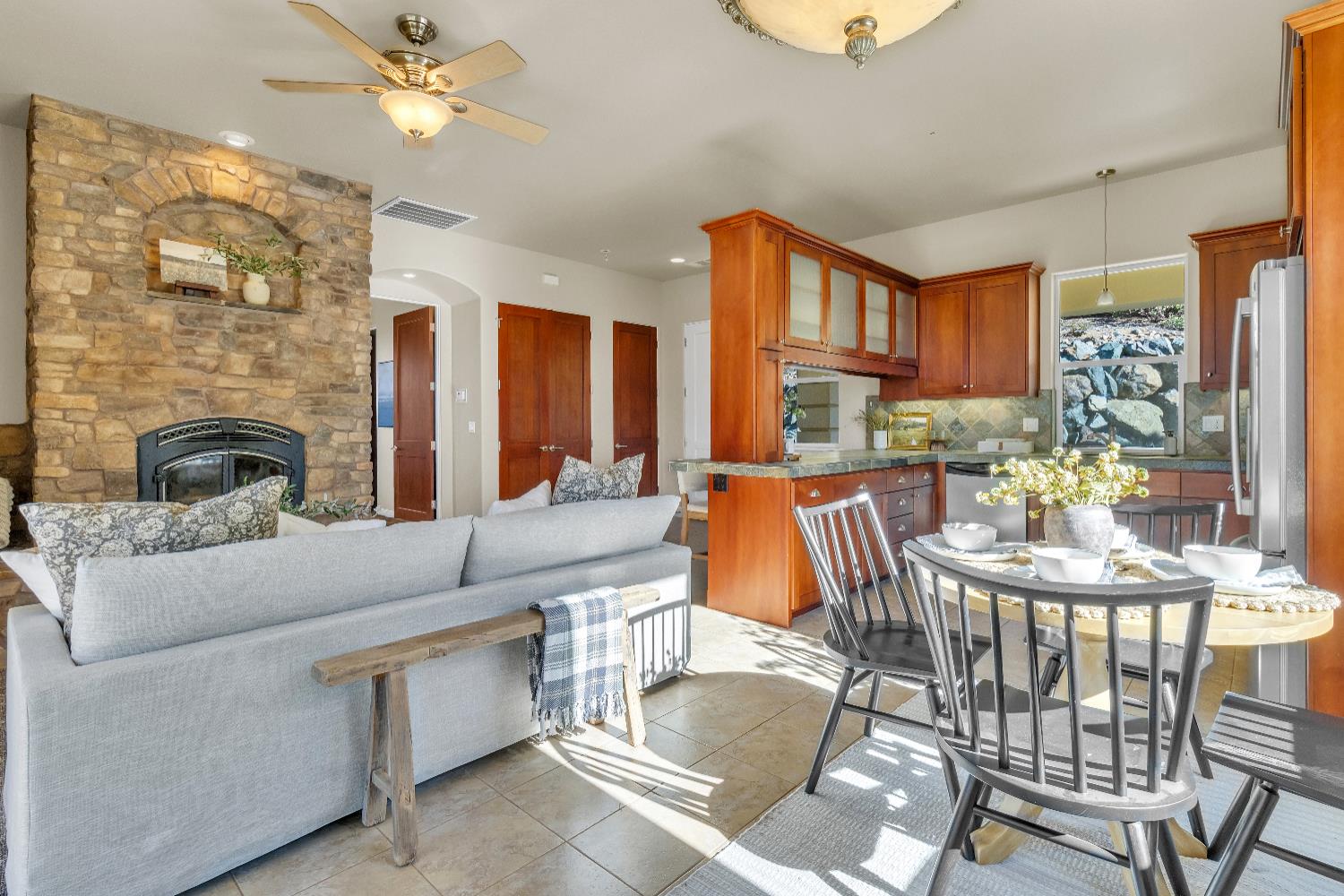 34275 Canyon View Court Alta, CA 95701 - Photo 9 of 35 a living room with fireplace furniture and a chandelier