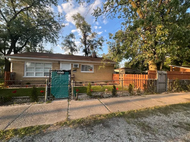 a view of a house with a street