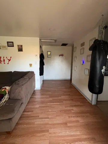 a dining room with kitchen island a table and chairs
