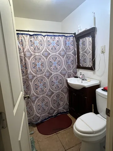 a view of a backyard of the house