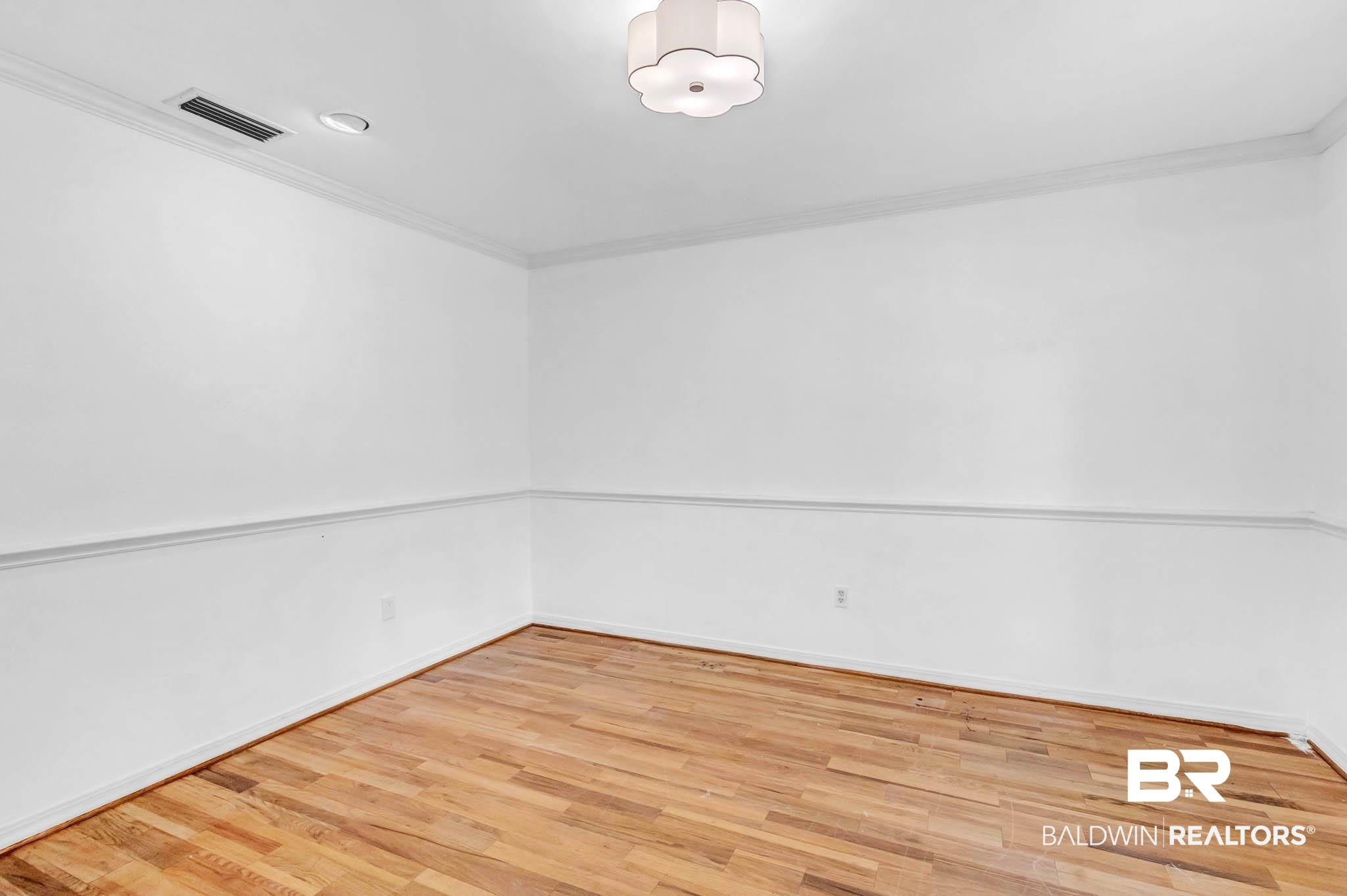 309 West Brandy Run Road Mobile, AL 36608 - Photo 31 of 100 Unfurnished room with crown molding and wood finished floors