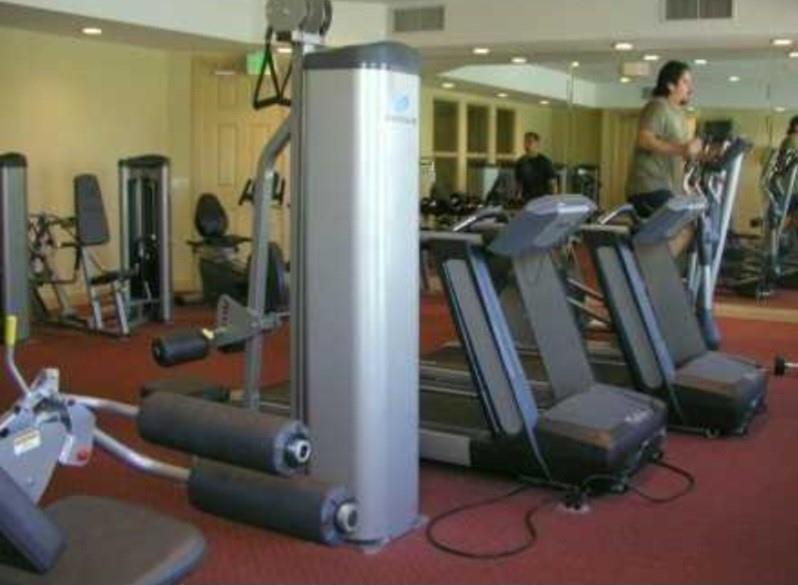 9082 Plymouth Place, Unit 9082 Tamarac, FL 33321 - Photo 14 of 47 a living room with furniture and a floor to ceiling window