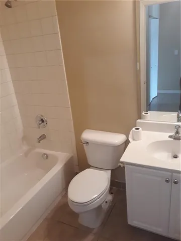 a bathroom with a sink toilet and bathtub