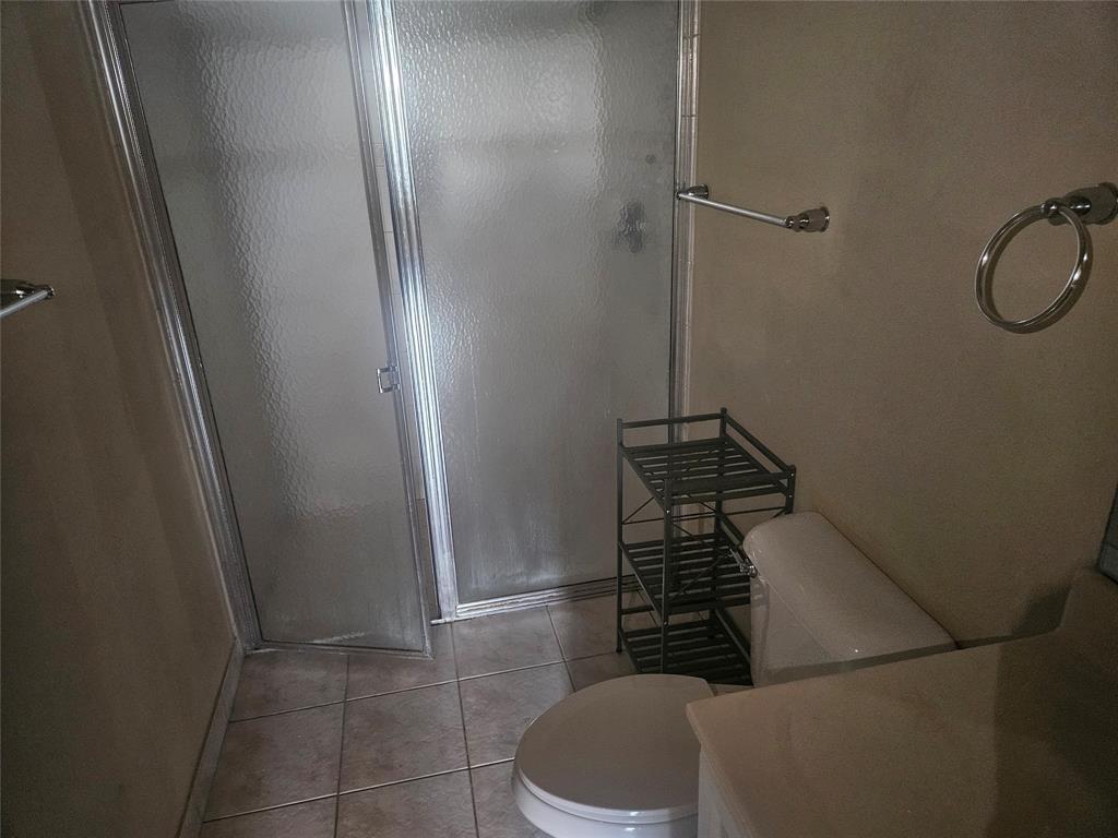 9082 Plymouth Place, Unit 9082 Tamarac, FL 33321 - Photo 41 of 47 a bathroom with a shower