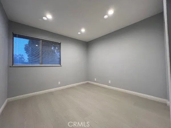 an empty room with a painting