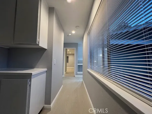 a view of a hallway with closet