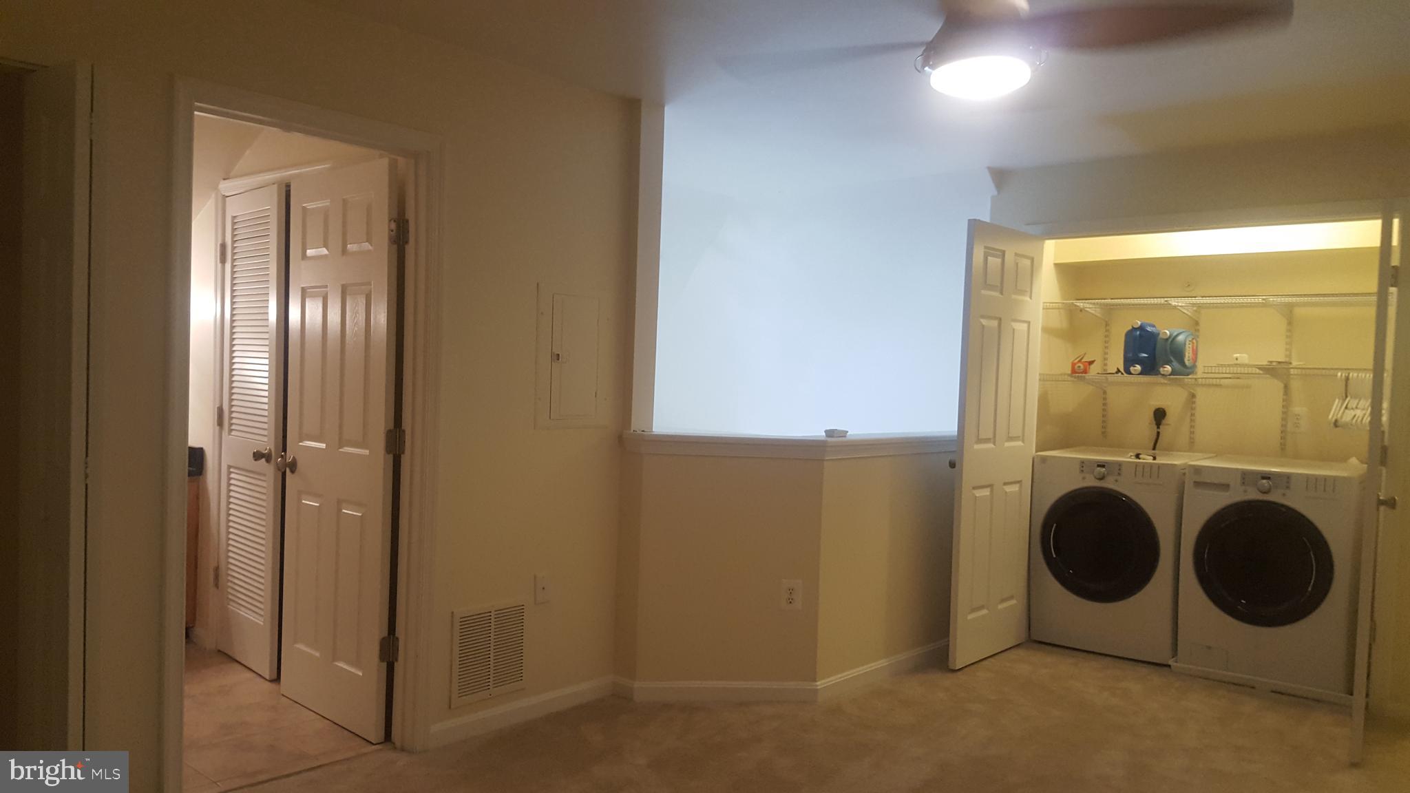 1049 Gardenview Loop, Unit 401 Woodbridge, VA 22191 - Photo 14 of 18 Spacious loft with full bath and washer and dryer