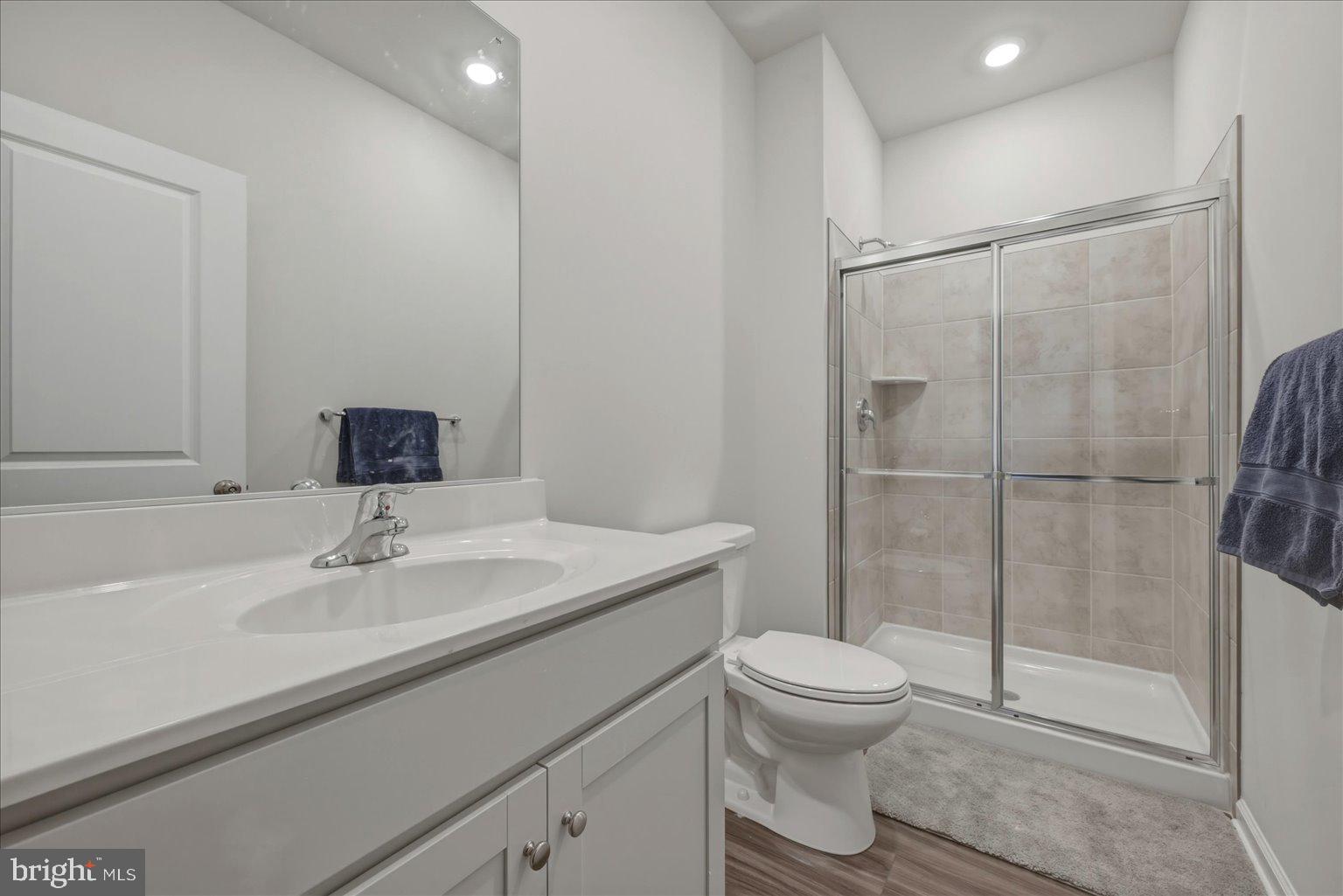 1311 Foal Street Ranson, WV 25438 - Photo 28 of 38 a bathroom with a sink toilet and shower