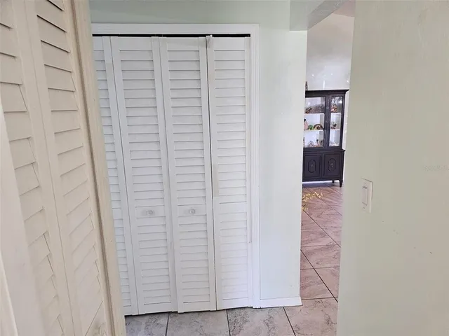a bathroom with a sink toilet and mirror