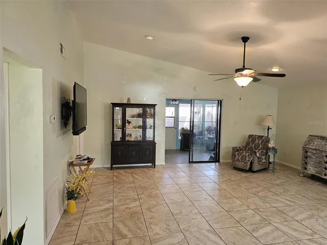 a room with gym equipment and a large window