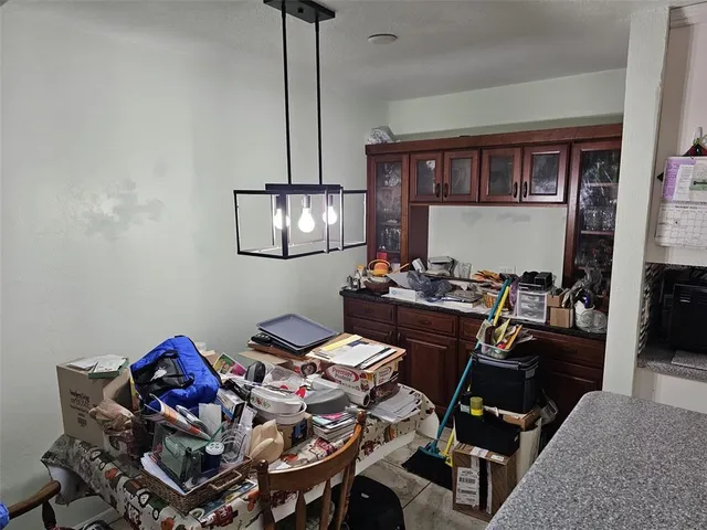 a view of a workspace and dining room