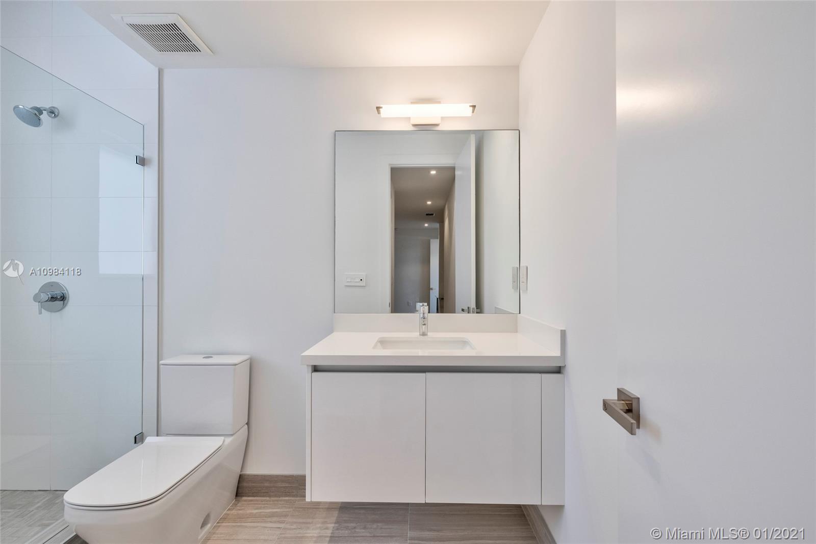 16610 Sunset Way Weston, FL 33326 - Photo 19 of 55 a bathroom with a sink toilet and shower