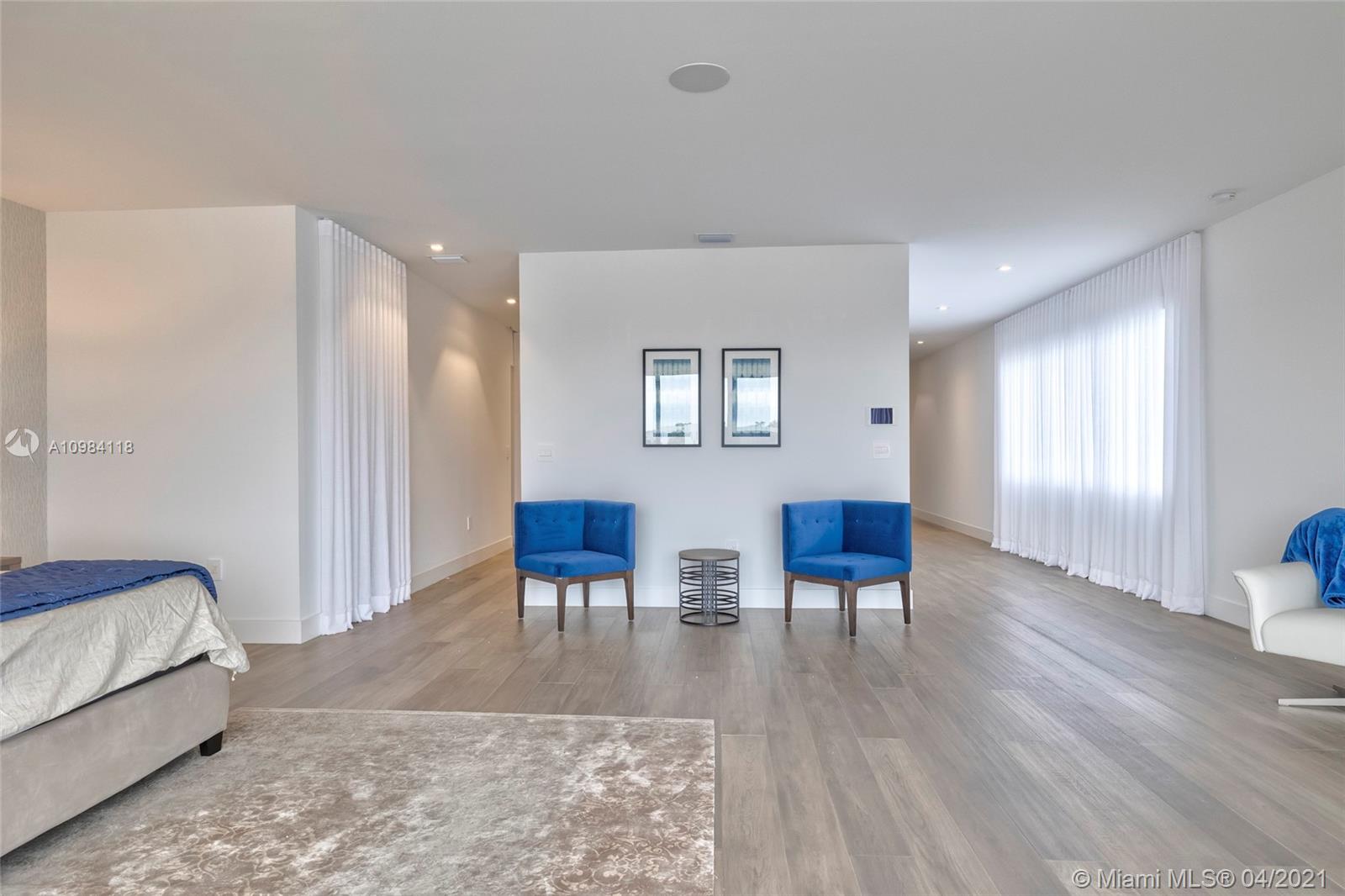 16610 Sunset Way Weston, FL 33326 - Photo 22 of 55 a living room with furniture and a wooden floor