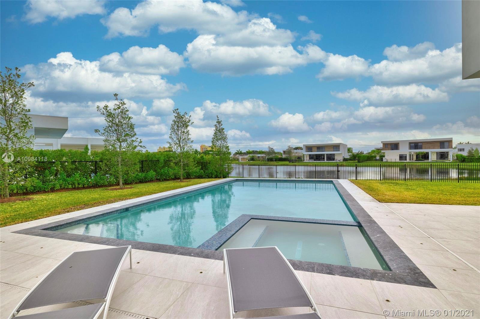 16610 Sunset Way Weston, FL 33326 - Photo 32 of 55 a view of swimming pool with a yard