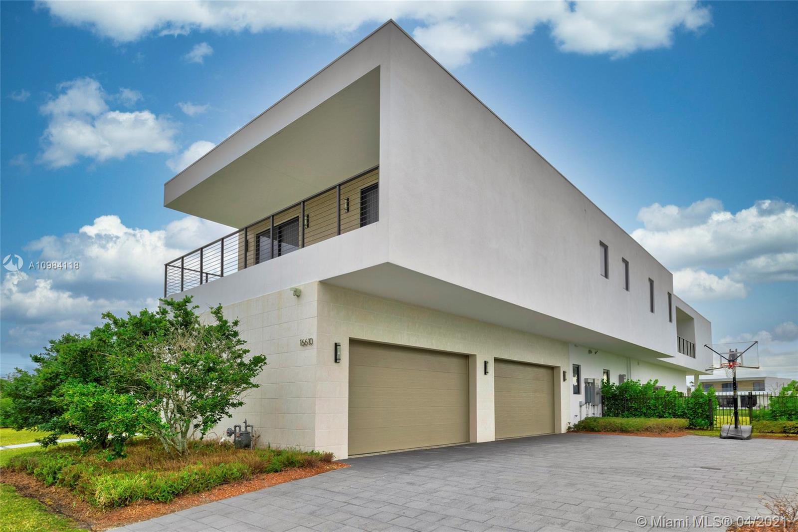 16610 Sunset Way Weston, FL 33326 - Photo 36 of 55 a house view with a garden space