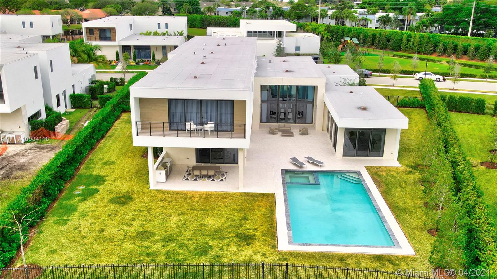 16610 Sunset Way Weston, FL 33326 - Photo 40 of 55 an aerial view of a house with swimming pool garden and patio