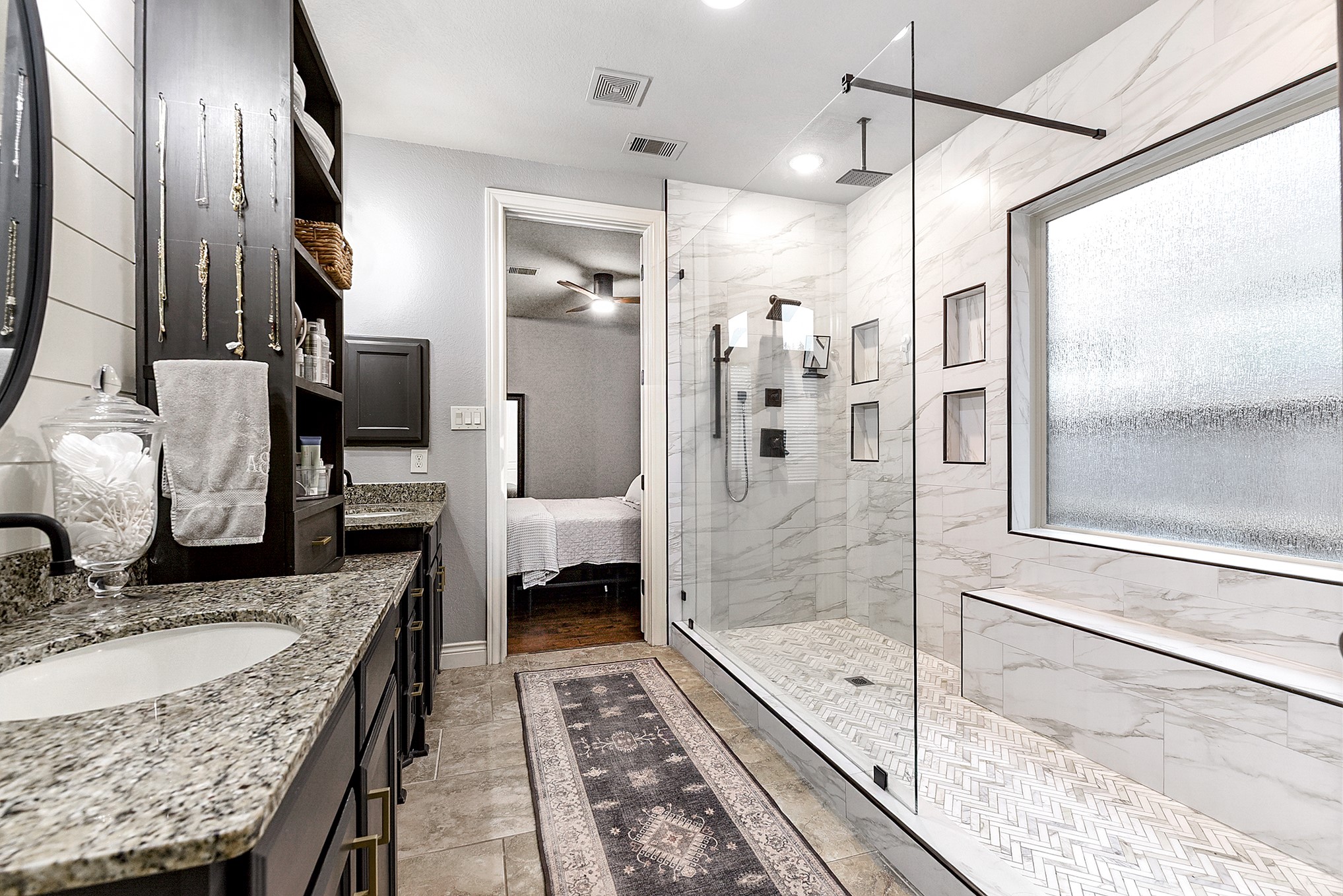 2939 Bobby Jones Road Katy, TX 77494 - Photo 27 of 50 a bathroom with a granite countertop bathtub shower sink and mirror