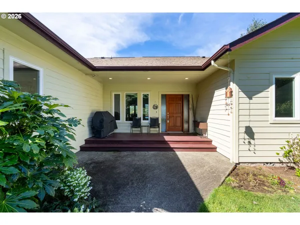 a backyard of a house with lots of green space