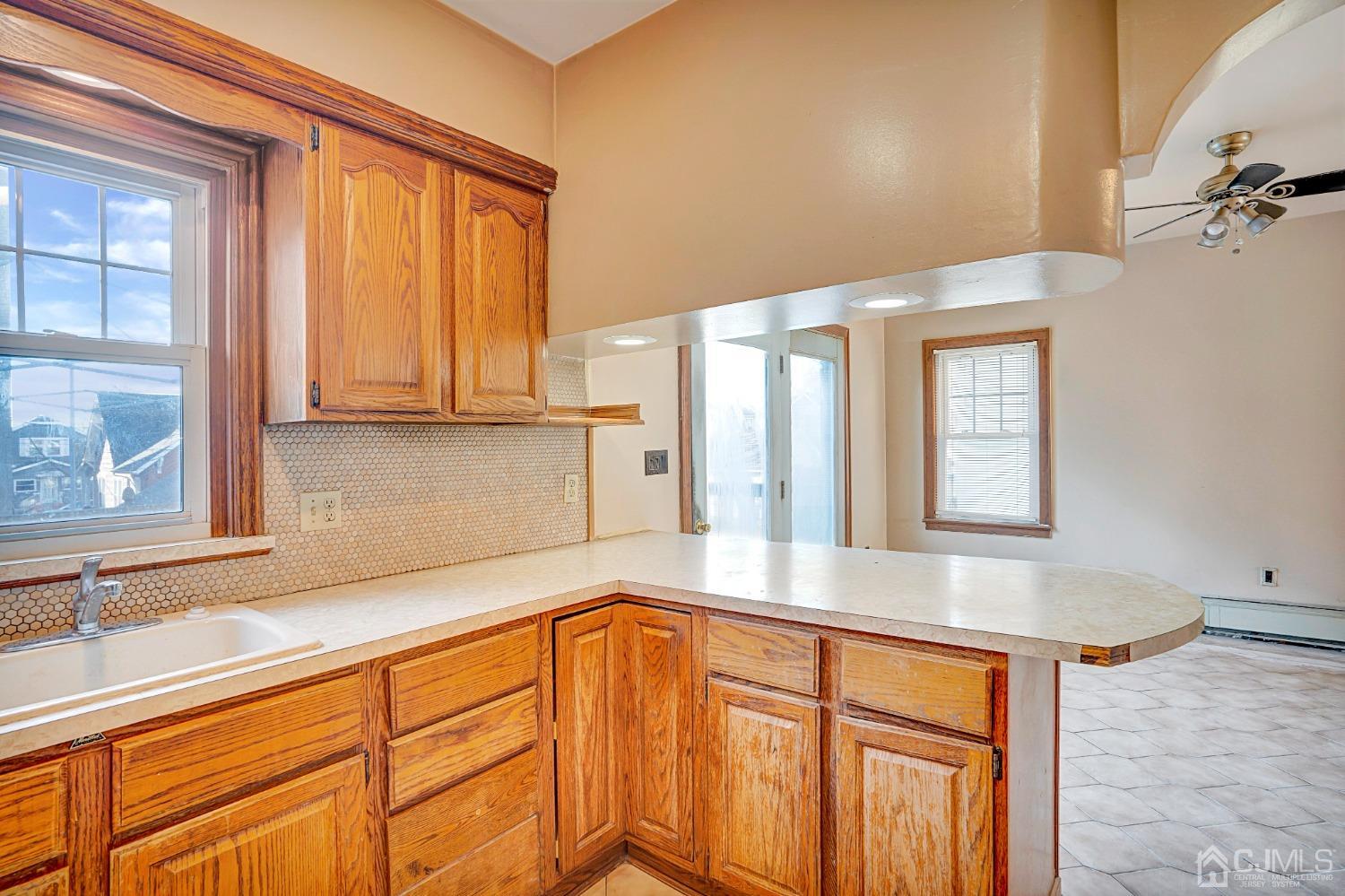 296 Argyle Place Kearny, NJ 07032 - Photo 12 of 38 a view of a kitchen with windows