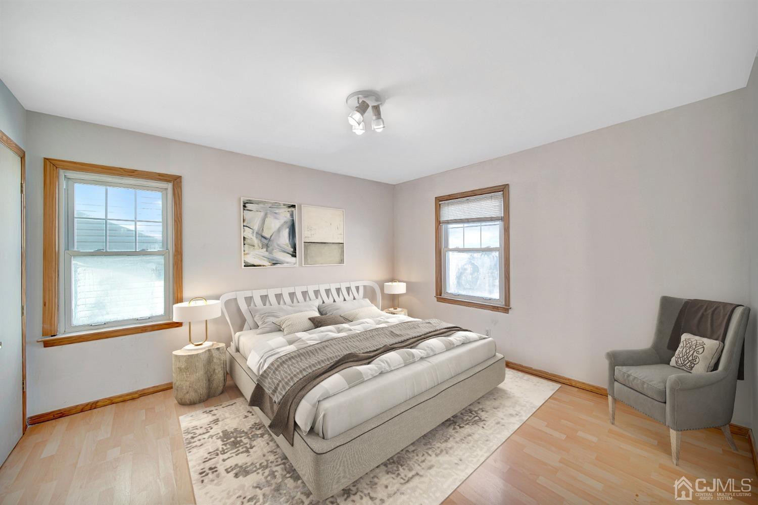 296 Argyle Place Kearny, NJ 07032 - Photo 25 of 38 a bedroom with a bed and a couch