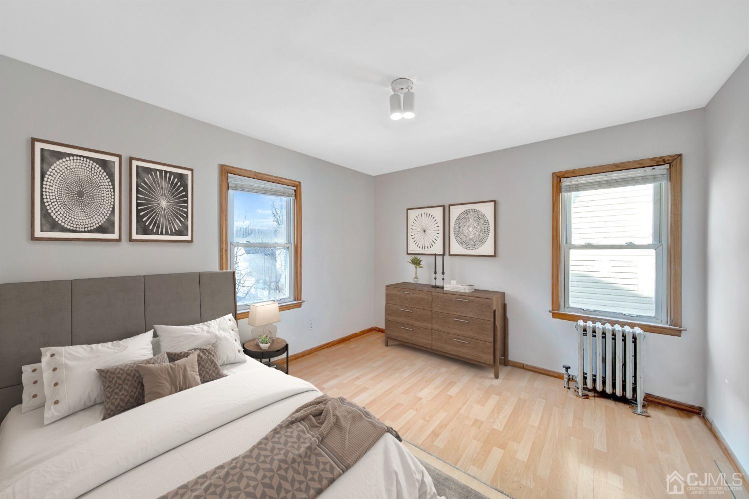 296 Argyle Place Kearny, NJ 07032 - Photo 27 of 38 a bedroom with furniture and a window