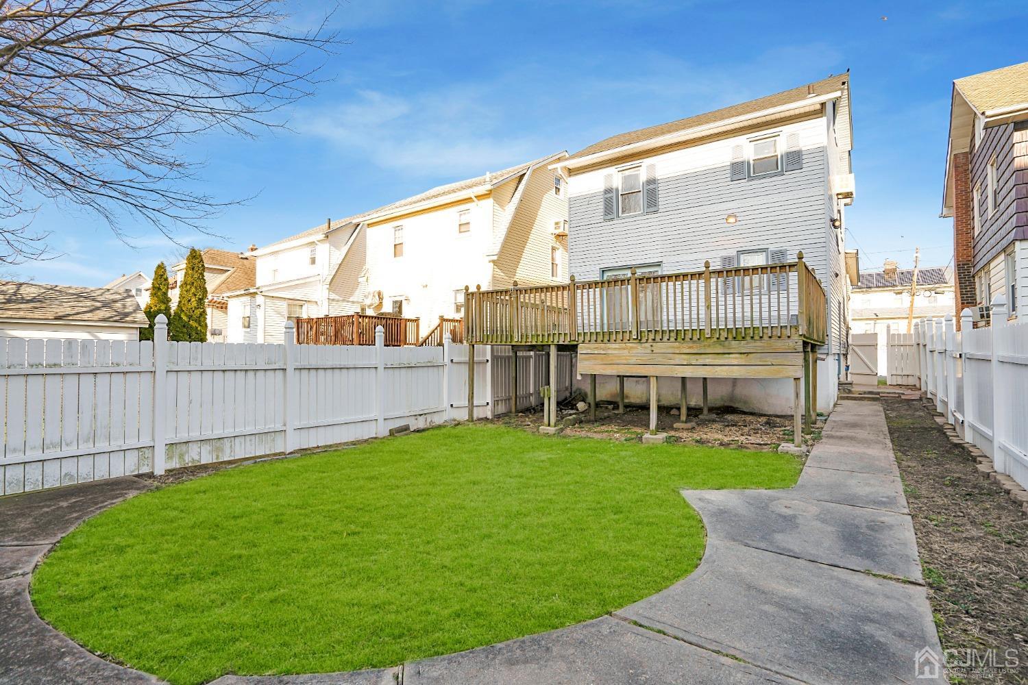 296 Argyle Place Kearny, NJ 07032 - Photo 38 of 38 a view of a backyard with sitting area
