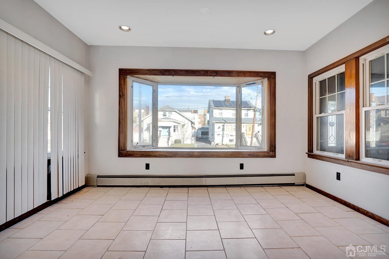 296 Argyle Place Kearny, NJ 07032 - Photo 6 of 38 a view of an empty room with a window