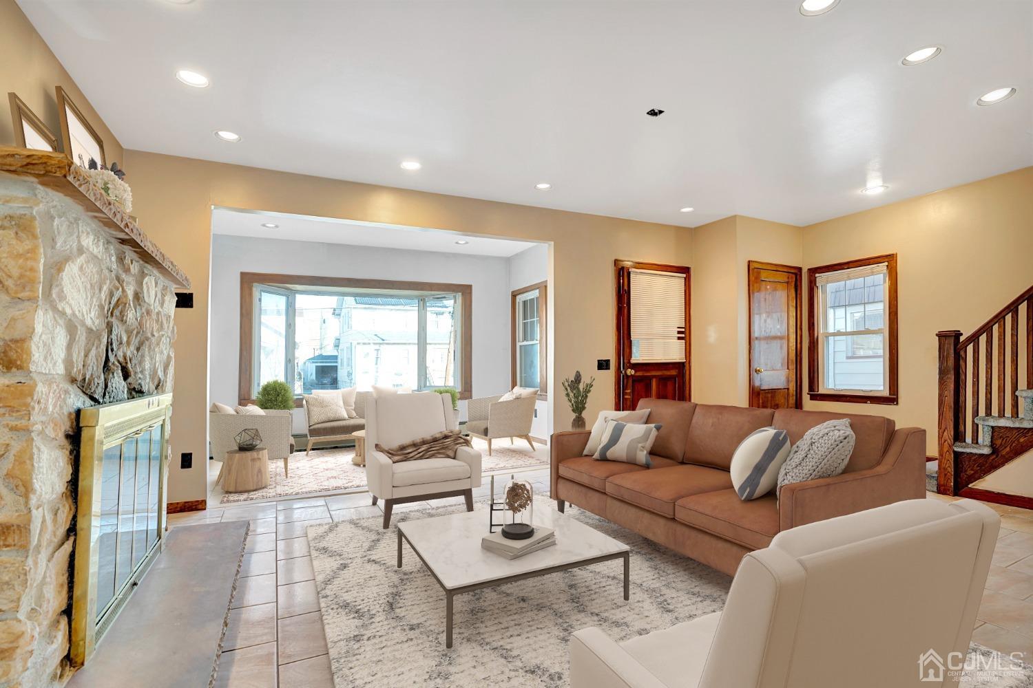 296 Argyle Place Kearny, NJ 07032 - Photo 7 of 38 a living room with furniture and a fireplace