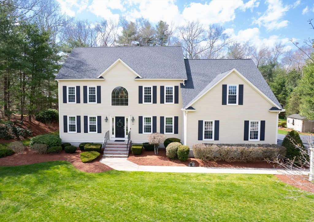 23 Northern Spy Road Franklin, MA 02038 - Photo 1 of 41 a front view of a house with a yard and porch