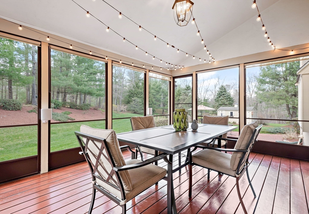 23 Northern Spy Road Franklin, MA 02038 - Photo 15 of 41 a dining room with furniture a chandelier and wooden floor