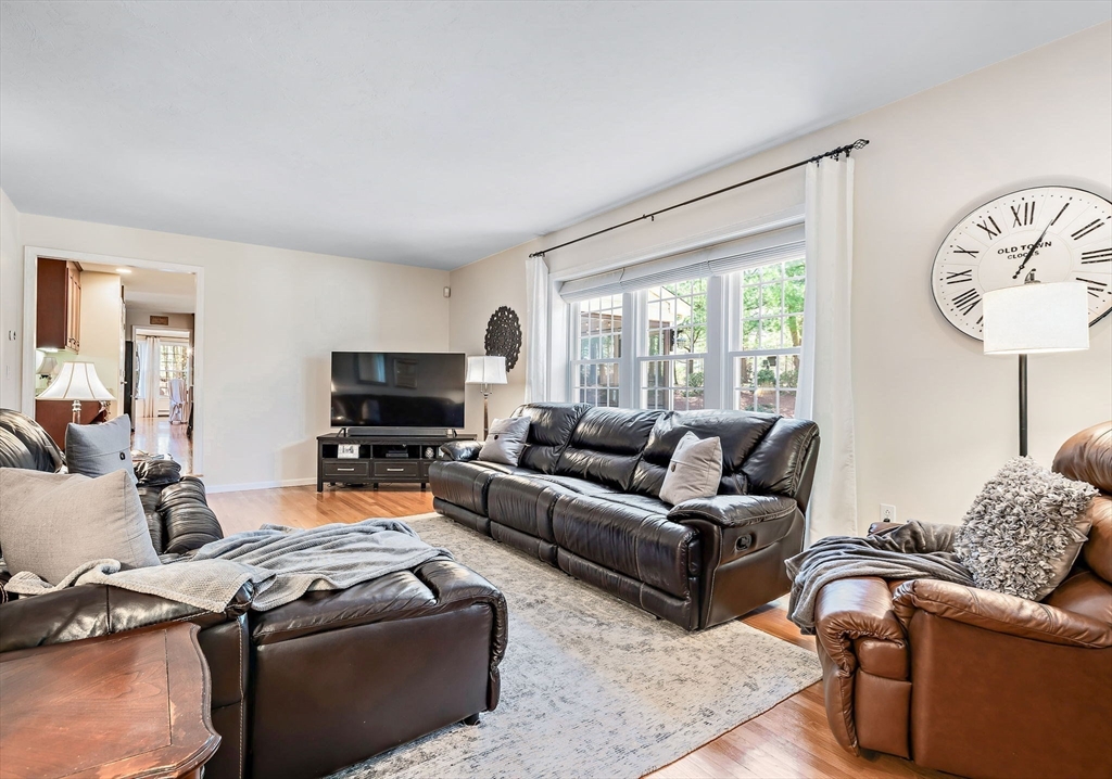 23 Northern Spy Road Franklin, MA 02038 - Photo 18 of 41 a living room with furniture and a flat screen tv