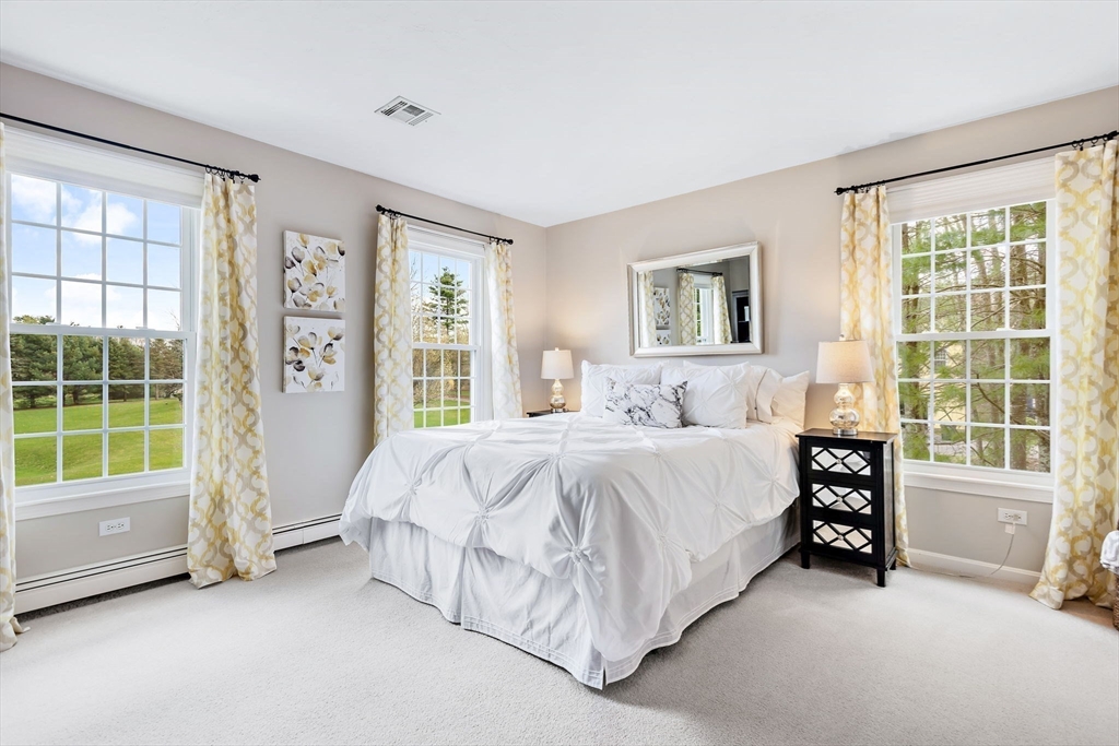 23 Northern Spy Road Franklin, MA 02038 - Photo 20 of 41 a spacious bedroom with a bed and a large window