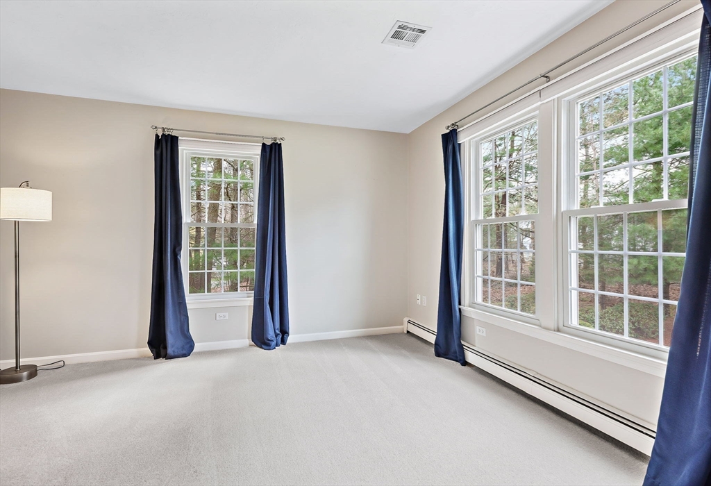 23 Northern Spy Road Franklin, MA 02038 - Photo 23 of 41 an empty room with windows