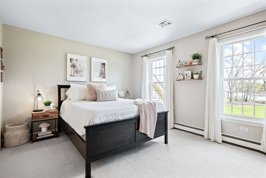 23 Northern Spy Road Franklin, MA 02038 - Photo 26 of 41 a bedroom with a bed and a window