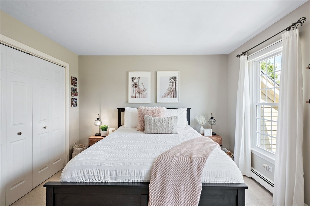 23 Northern Spy Road Franklin, MA 02038 - Photo 27 of 41 a bedroom with a bed and a window