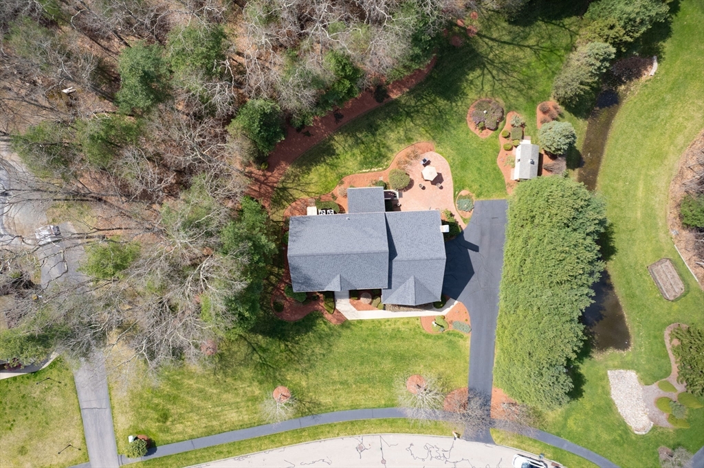 23 Northern Spy Road Franklin, MA 02038 - Photo 3 of 41 an aerial view of a house with a garden and trees