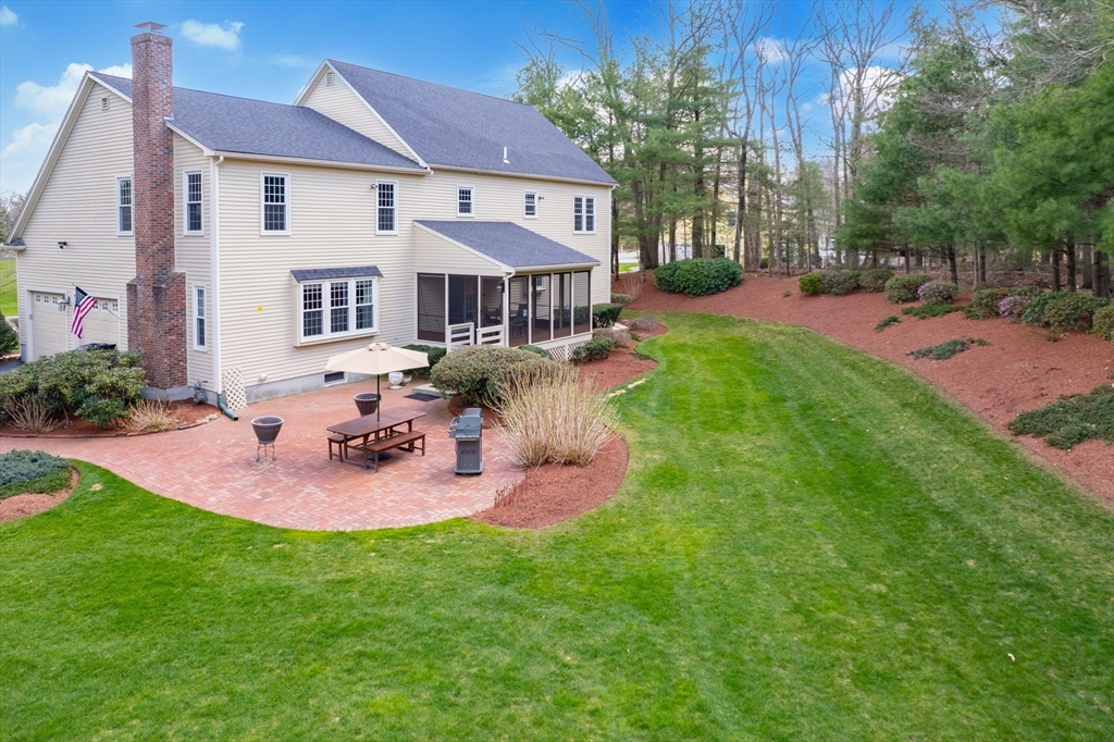 23 Northern Spy Road Franklin, MA 02038 - Photo 34 of 41 a view of a house with backyard and sitting area