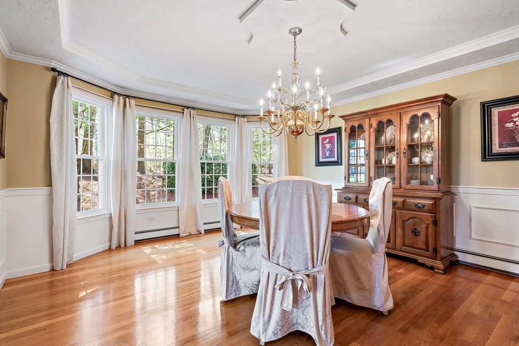 23 Northern Spy Road Franklin, MA 02038 - Photo 10 of 41 a view of a dining room with furniture window and wooden floor