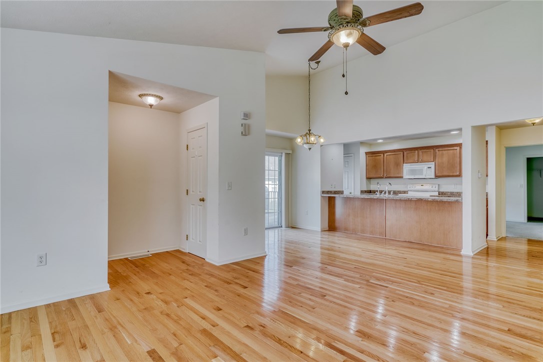 200 Rayfield Circle Webster, NY 14580 - Photo 13 of 41 LIVING ROOM VIEW TO DINING AREA & BREAKFAST BAR/KI