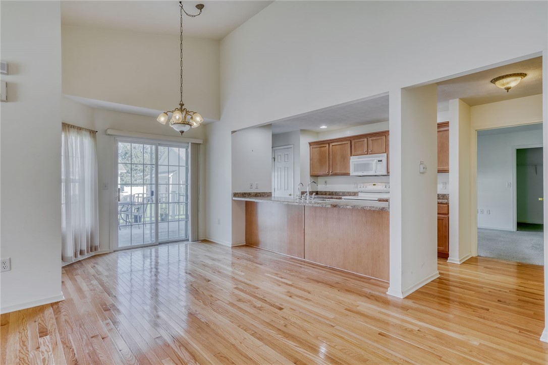 200 Rayfield Circle Webster, NY 14580 - Photo 15 of 41 DINING AREA WITH SLIDER TO DECK