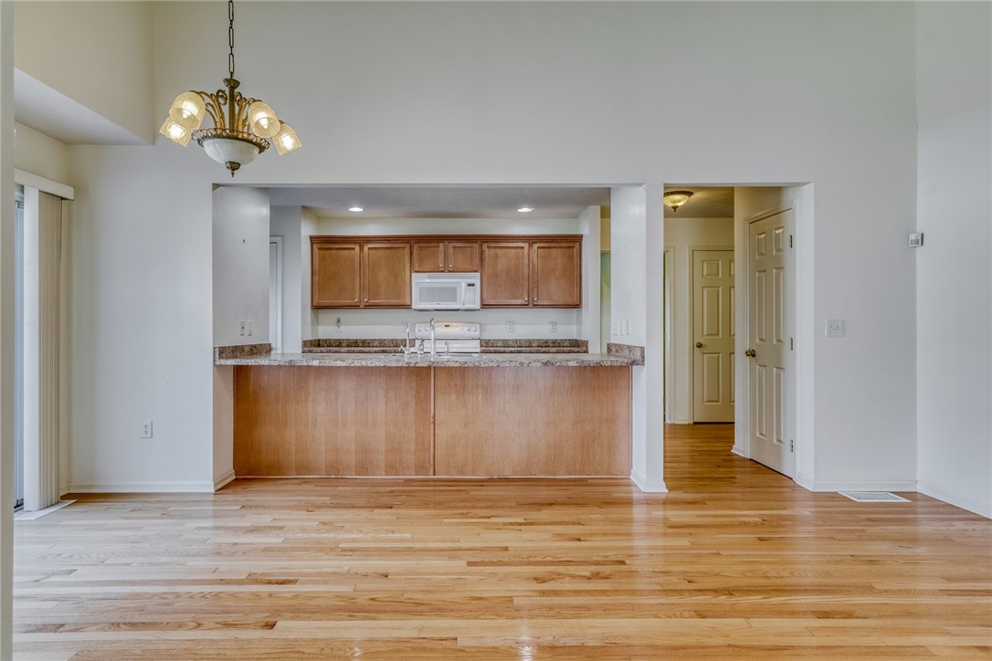 200 Rayfield Circle Webster, NY 14580 - Photo 19 of 41 VIEW TO KITCHEN BREAKFAST BAR